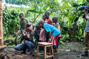 Dana Cook behind the camera, showing curious kids.