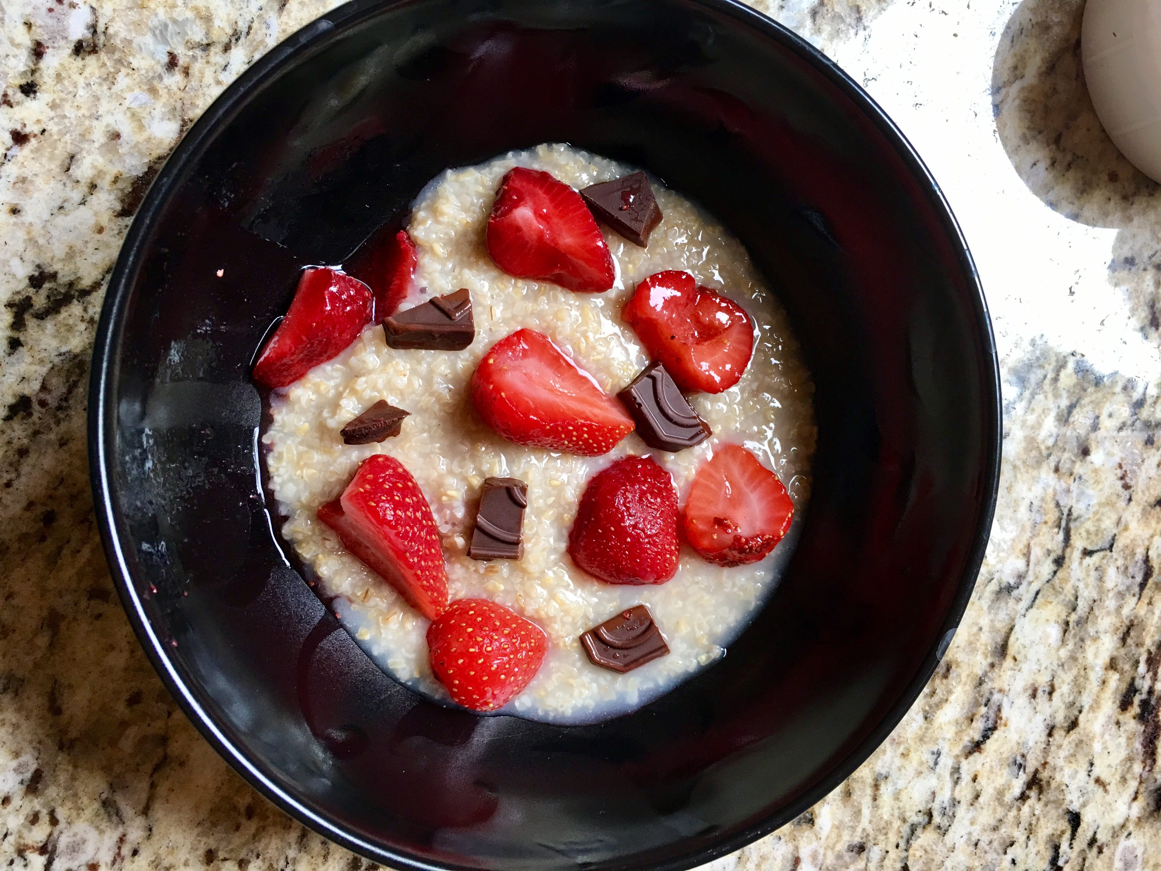 Breakfast: Steel cut oats with strawberries and dark chocolate